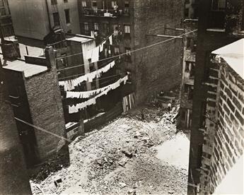 ARNOLD EAGLE (1909-1992) 10 Cent All Night Movie House near 14th Street * Courtyard with rows of laundry lines.
